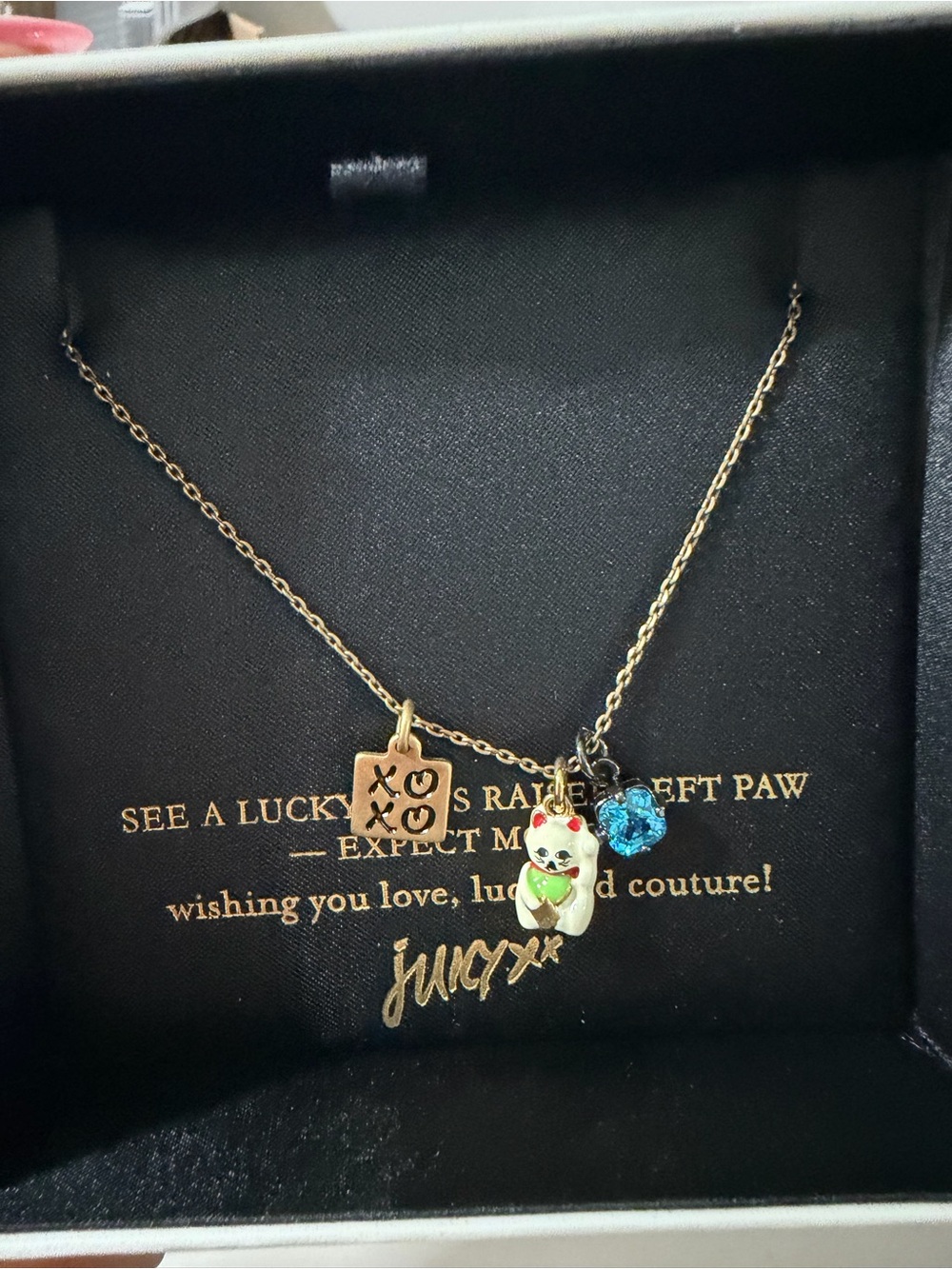 Juicy Couture Gold Tone Lucky Cat Trio Necklace with Blue Crystal
